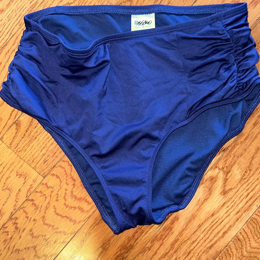 Violet color bottoms. Never worn.